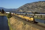 UP GP38-2 2005 with Westbound along Columbia River Dec 1986